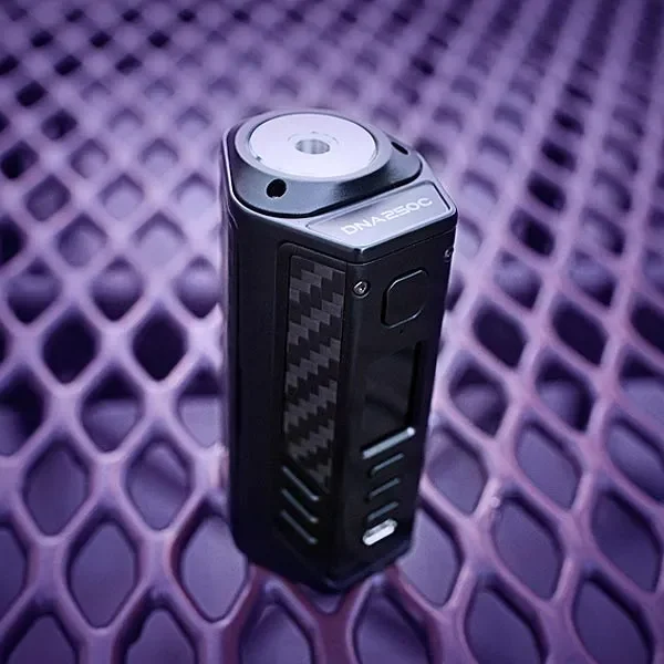 image of a triade 250c vape device on a purple mesh background